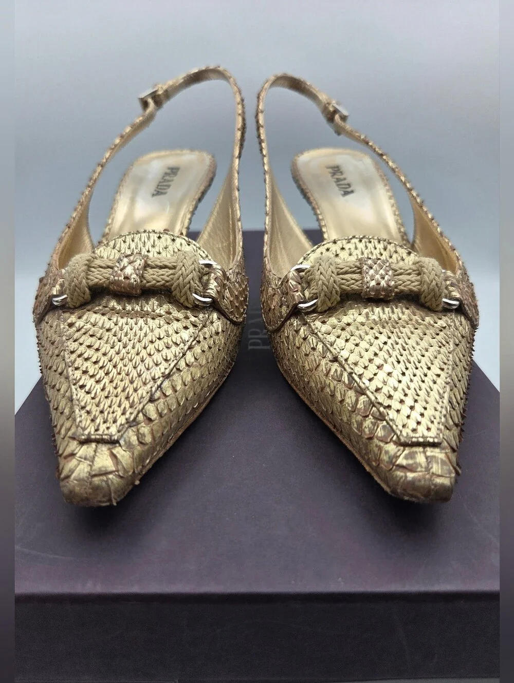 Pre- owned Prada snakeskin braided accents slingback pumps in a metallic gold